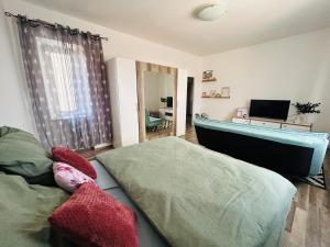 Postel nebo postele na pokoji v ubytování Brno Central Apartment