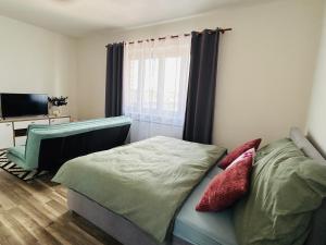 Postel nebo postele na pokoji v ubytování Brno Central Apartment