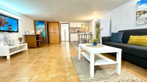 Et opholdsområde på Acogedor apartamento cerca de la playa, WiFI