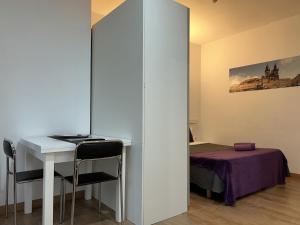 Postel nebo postele na pokoji v ubytování Apartahotel Baldiri