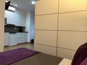 Kuchyň nebo kuchyňský kout v ubytování Apartahotel Baldiri