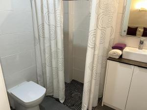 Koupelna v ubytování Apartahotel Baldiri