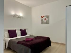 Postel nebo postele na pokoji v ubytování Apartahotel Baldiri