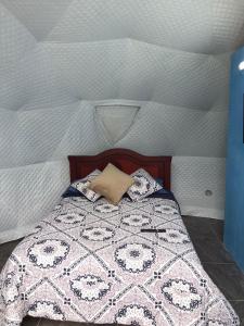 Postel nebo postele na pokoji v ubytování Quinta Verde Limón