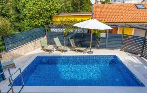 Bazén v ubytování 4 Bedroom Lovely Home In Selce nebo v jeho okolí