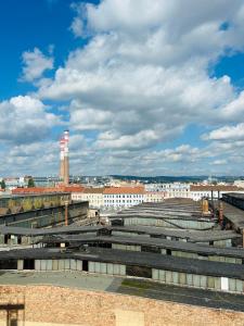 Nespecifikovaný výhled na destinaci Brno nebo výhled na město při pohledu z apartmánu