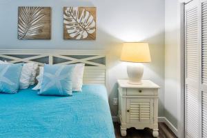 Postelja oz. postelje v sobi nastanitve Lazy Daze Double King Suite Ocean Pointe 2310