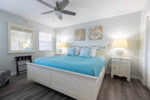 Postelja oz. postelje v sobi nastanitve Lazy Daze Double King Suite Ocean Pointe 2310