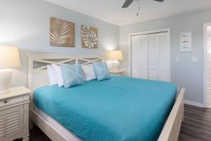 Postelja oz. postelje v sobi nastanitve Lazy Daze Double King Suite Ocean Pointe 2310