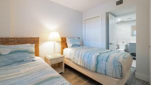 Letto o letti in una camera di Nauti Hideaway Ocean Pointe 2314