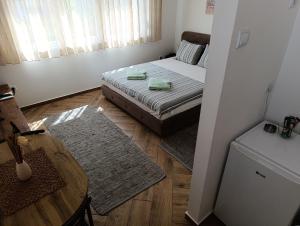 Кровать или кровати в номере Nikolic apartment