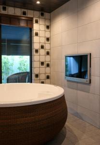 TV a/nebo společenská místnost v ubytování Villa 石の蔵 Hotel