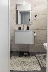 Koupelna v ubytování Modern Apartment 305