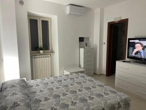 TV a/nebo společenská místnost v ubytování B&B Room Code 2