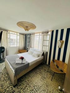 Ένα ή περισσότερα κρεβάτια σε δωμάτιο στο La CASA del CONDE