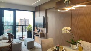 Χώρος καθιστικού στο Apartamento em Dourados, Sunset
