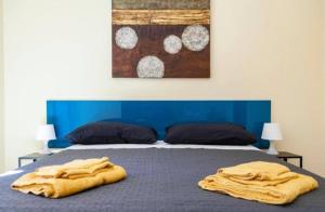Postel nebo postele na pokoji v ubytování Calefati Holiday 412