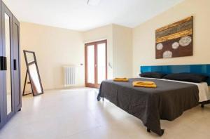 Postel nebo postele na pokoji v ubytování Calefati Holiday 412