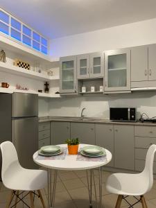 Η κουζίνα ή μικρή κουζίνα στο Be Crete - Zen Appartments 1 room +11 φωτογραφίες