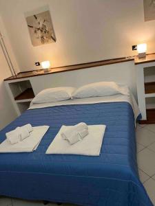 Ένα ή περισσότερα κρεβάτια σε δωμάτιο στο Andromeda Holiday 1 C