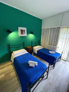Postel nebo postele na pokoji v ubytování B&B Mary&Giuly