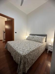 Letto o letti in una camera di L'Attichetto di via Padova