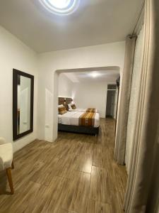 Postel nebo postele na pokoji v ubytování Hotel Rumi
