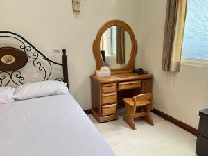Vuode tai vuoteita majoituspaikassa 天隆民宿Tian Long Tea Farm HomeStay