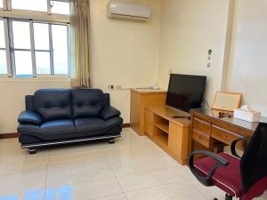 TV tai viihdekeskus majoituspaikassa 天隆民宿Tian Long Tea Farm HomeStay