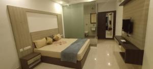 Postel nebo postele na pokoji v ubytování Central Abode Family Rooms