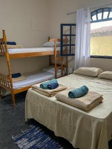 Postel nebo postele na pokoji v ubytování Casa Surya Paraty + 37 fotografií