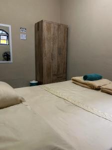 Postel nebo postele na pokoji v ubytování Casa Surya Paraty