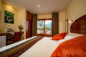 Postel nebo postele na pokoji v ubytování Hotel Agustos Urubamba + 37 fotografií