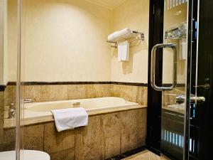 Koupelna v ubytování TTC Imperial Hotel