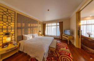 TV a/nebo společenská místnost v ubytování TTC Imperial Hotel