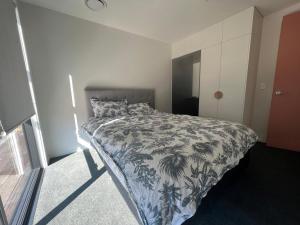 Postel nebo postele na pokoji v ubytování Cosy Kinloch