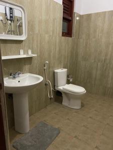 Ein Badezimmer in der Unterkunft Why Not Palace