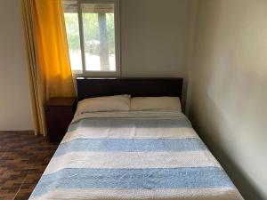 Postel nebo postele na pokoji v ubytování Panglao Haven