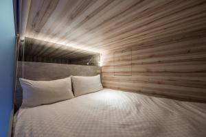 Letto o letti in una camera di Art Inn - Kaifeng