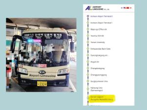 a bus is parked at a bus stop at Hanok Guesthouse Suni in Seoul