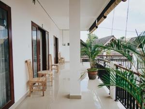 Uma varanda ou terraço em pondok arsa canggu