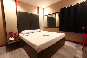 Postel nebo postele na pokoji v ubytování Hotel Sogo San Jose Del Monte, Bulacan