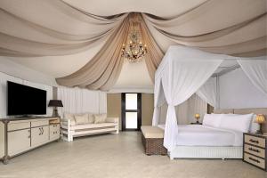 Natra Bintan, a Tribute Portfolio Resort客房内的一张或多张床位