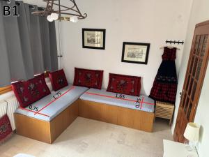 Postel nebo postele na pokoji v ubytování Το σπίτι της πλατείας