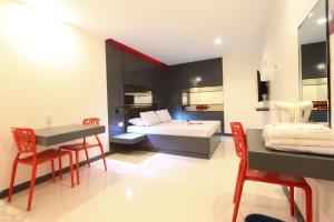 Postel nebo postele na pokoji v ubytování Hotel Sogo San Jose Del Monte, Bulacan