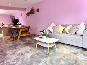 a living room with a couch and a table at Casa Lina in Valladolid