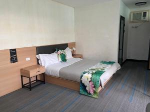 Postel nebo postele na pokoji v ubytování Jasper Motor Inn