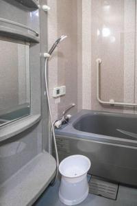 Et badeværelse på ゲストハウスわん粉浜