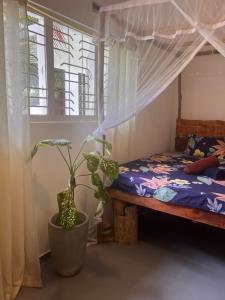 Una cama o camas en una habitación de The Drop In Madiha I Double Bedroom with private Bathroom