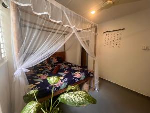 Galería fotográfica de The Drop In Madiha I Double Bedroom with private Bathroom en Madihe East